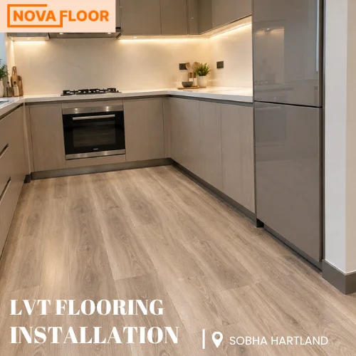 LVT planks fitted tightly around the kitchen cabinetry, oven, and fridge unit