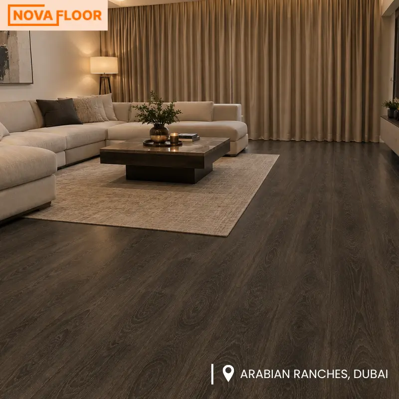 Modern villa living room with dark wood flooring and full-length beige curtains