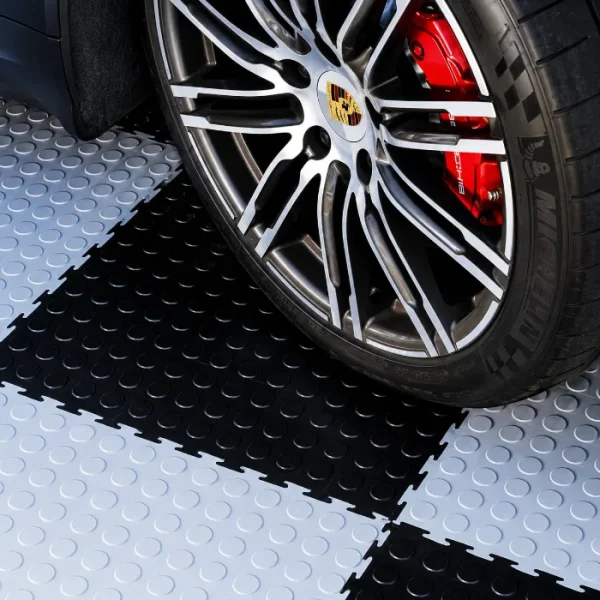 Nova Floor project: black and white coin-top tiles in a Dubai villa garage