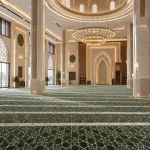 green and white patterned mosque carpet